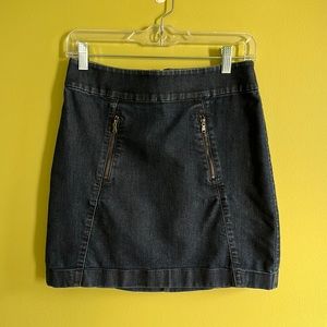 Any Taylor dark denim skirt with zip pockets. 16.5” long.